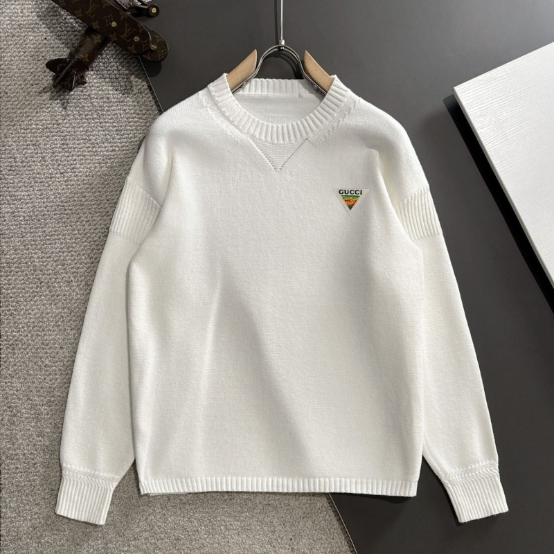 G*u*i sweaters